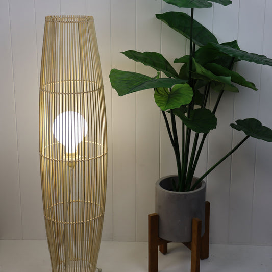 Matram cane floor lamp in a room setting