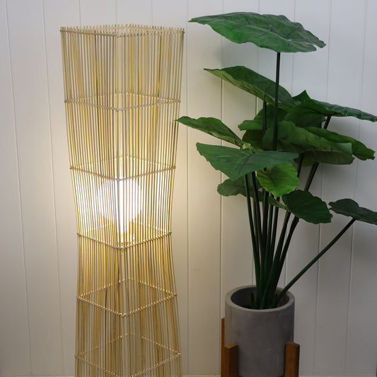 Jambi cane floor lamp in a room setting