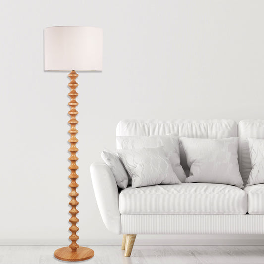 Spindle floor lamp in a room setting