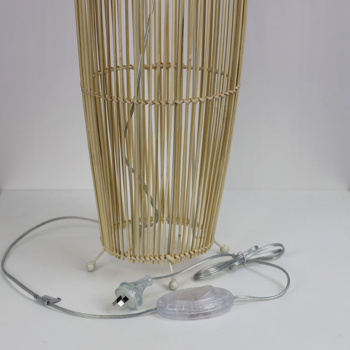 Matram cane floor lamp in a room setting